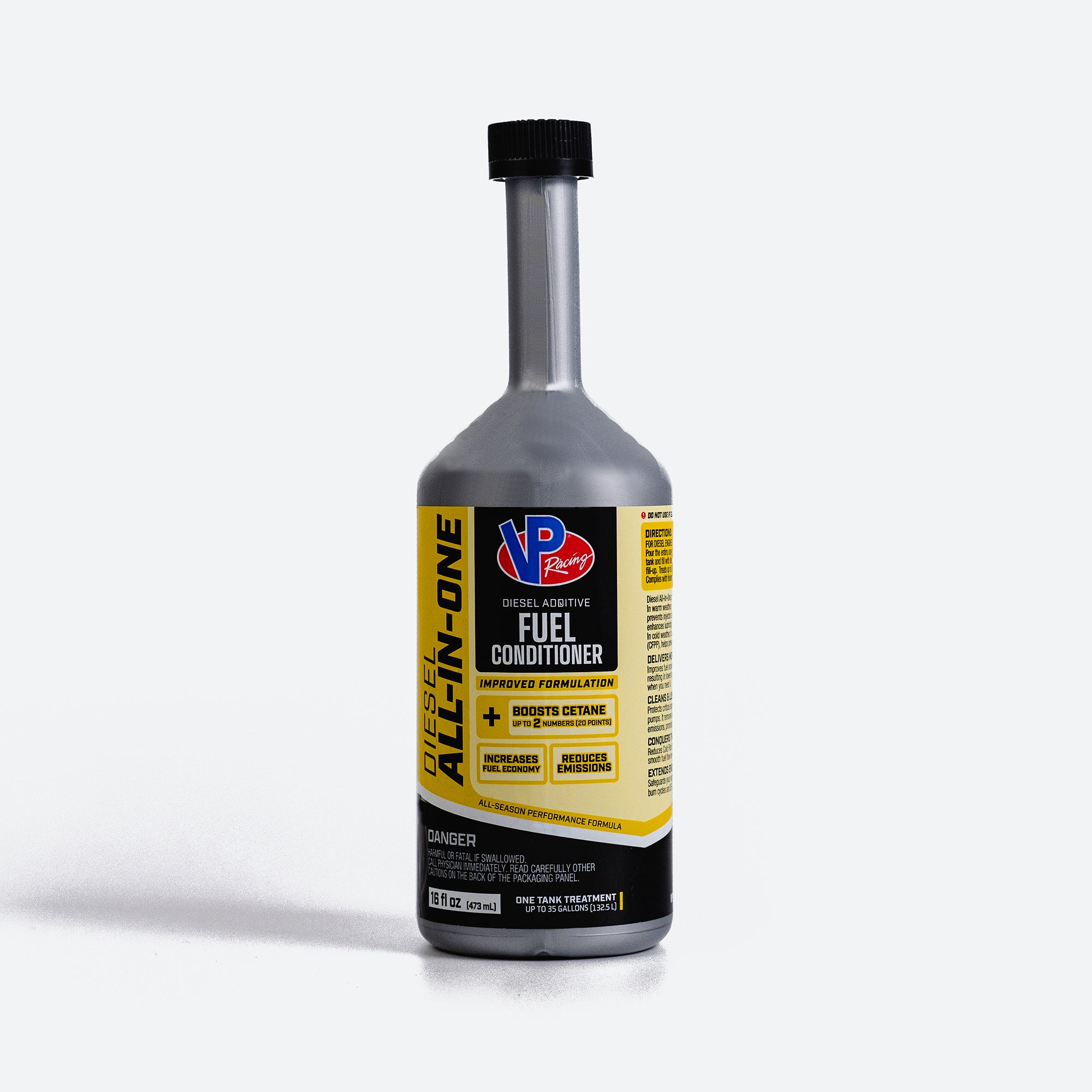 Bottle of fuel conditioner with a yellow label on a white background